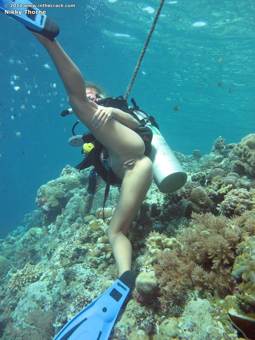 Girl nude underwater scuba diving