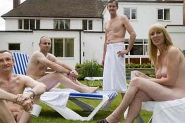 Nudist family at home