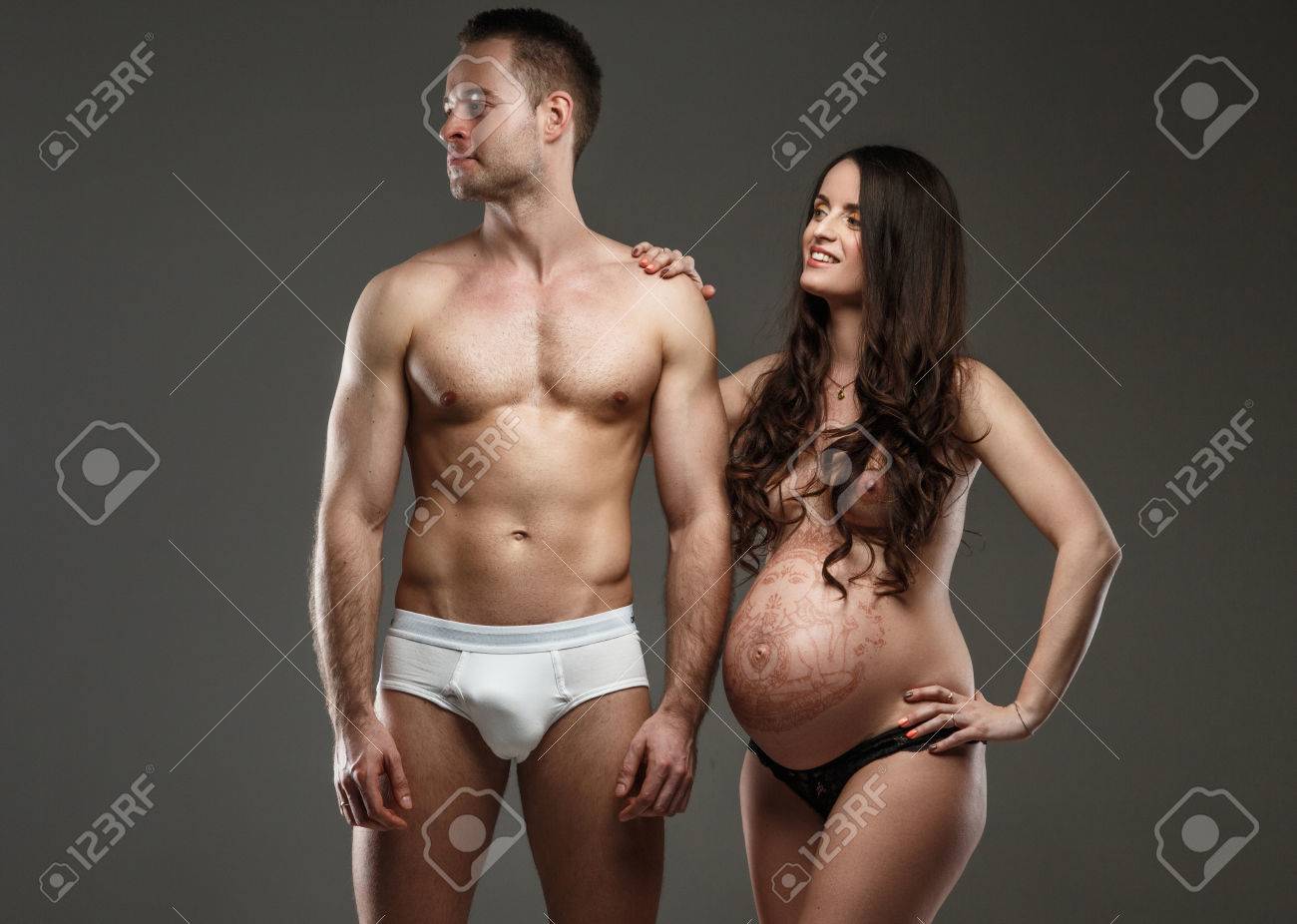 Women who are pregnant posing naked