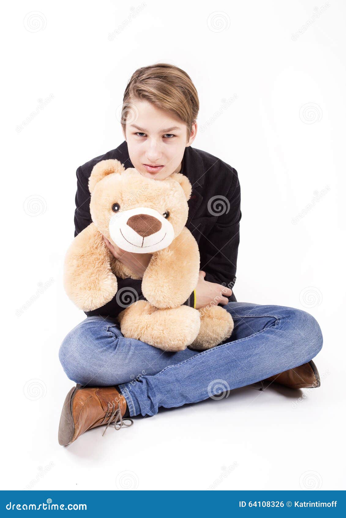 Teen with teddy bear