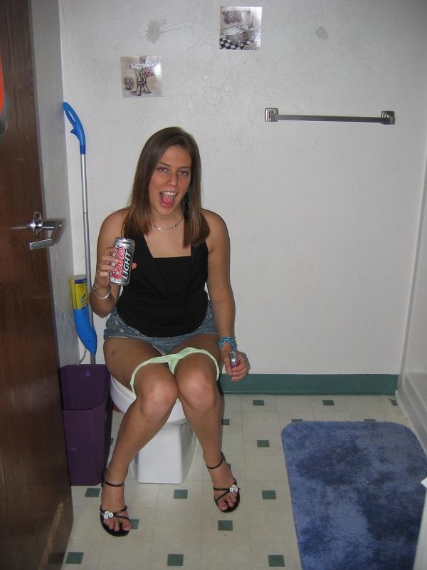 Girls pissing on toilet panties down